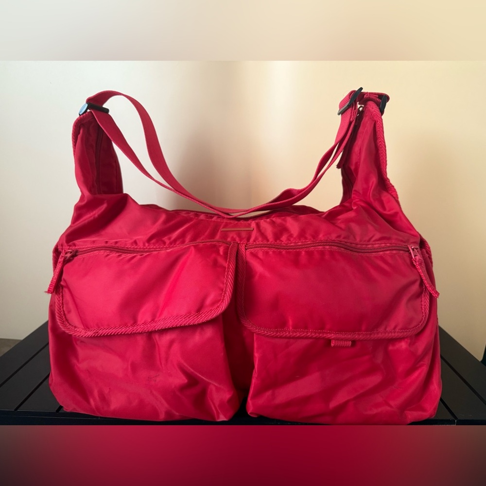 United Colors of Benetton red and orange nylon travel bag